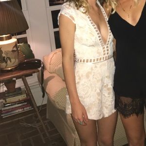 Very cute, off-white romper.